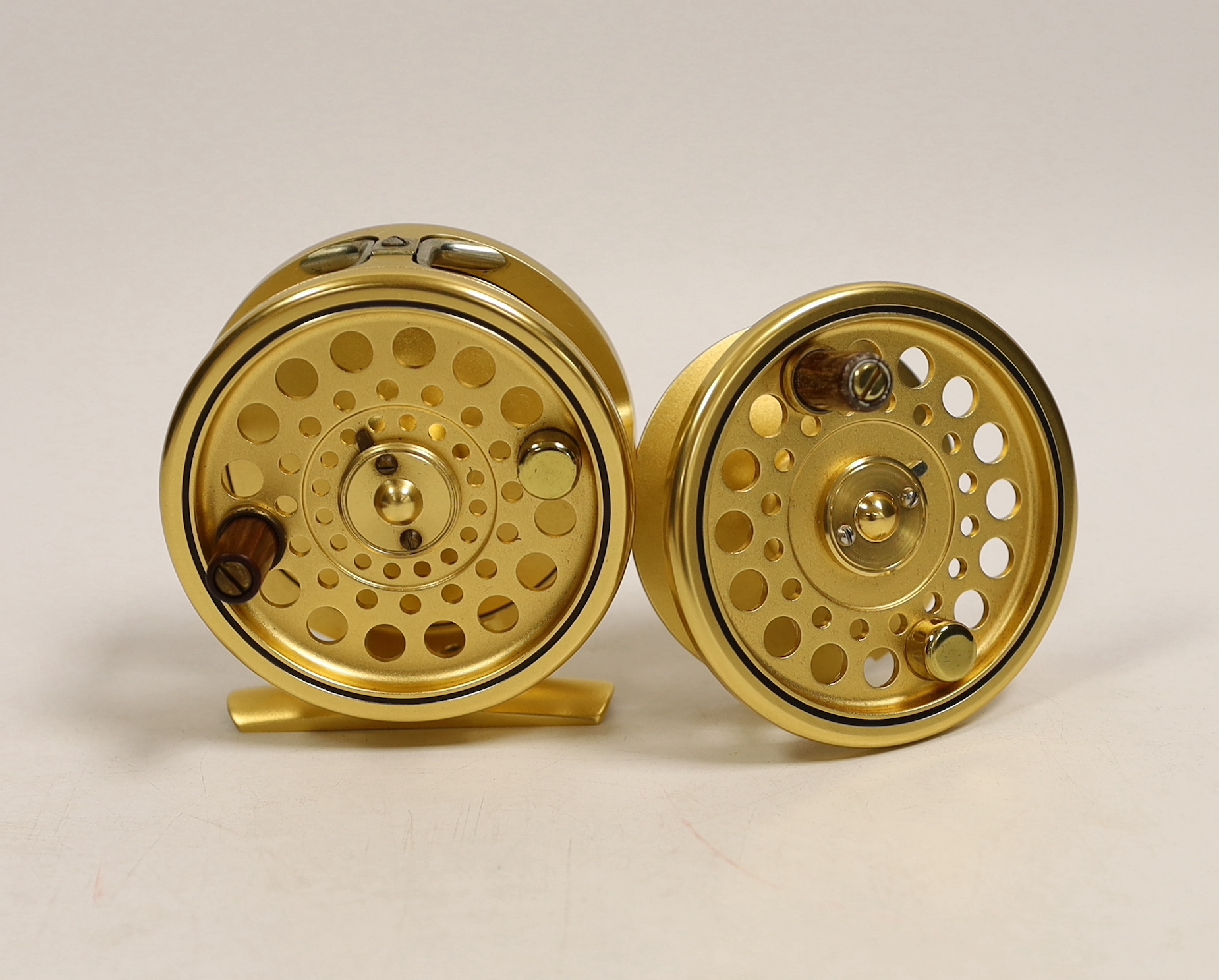 A House of Hardy Sovereign 3/4/5 centre pin fly reel, Serial Number 084 with spare spool, reel with sheepskin lined soft case (2)